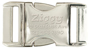 Metallic buckle with engraved text on a white background