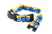 Dog collar with blue and yellow mountain design on a white background