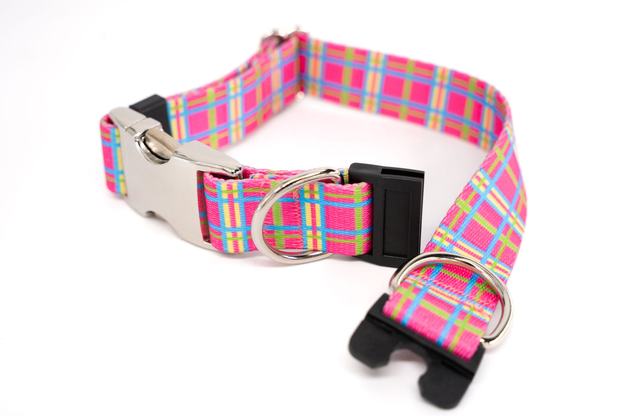 Dog collar with a colorful plaid pattern on a white background