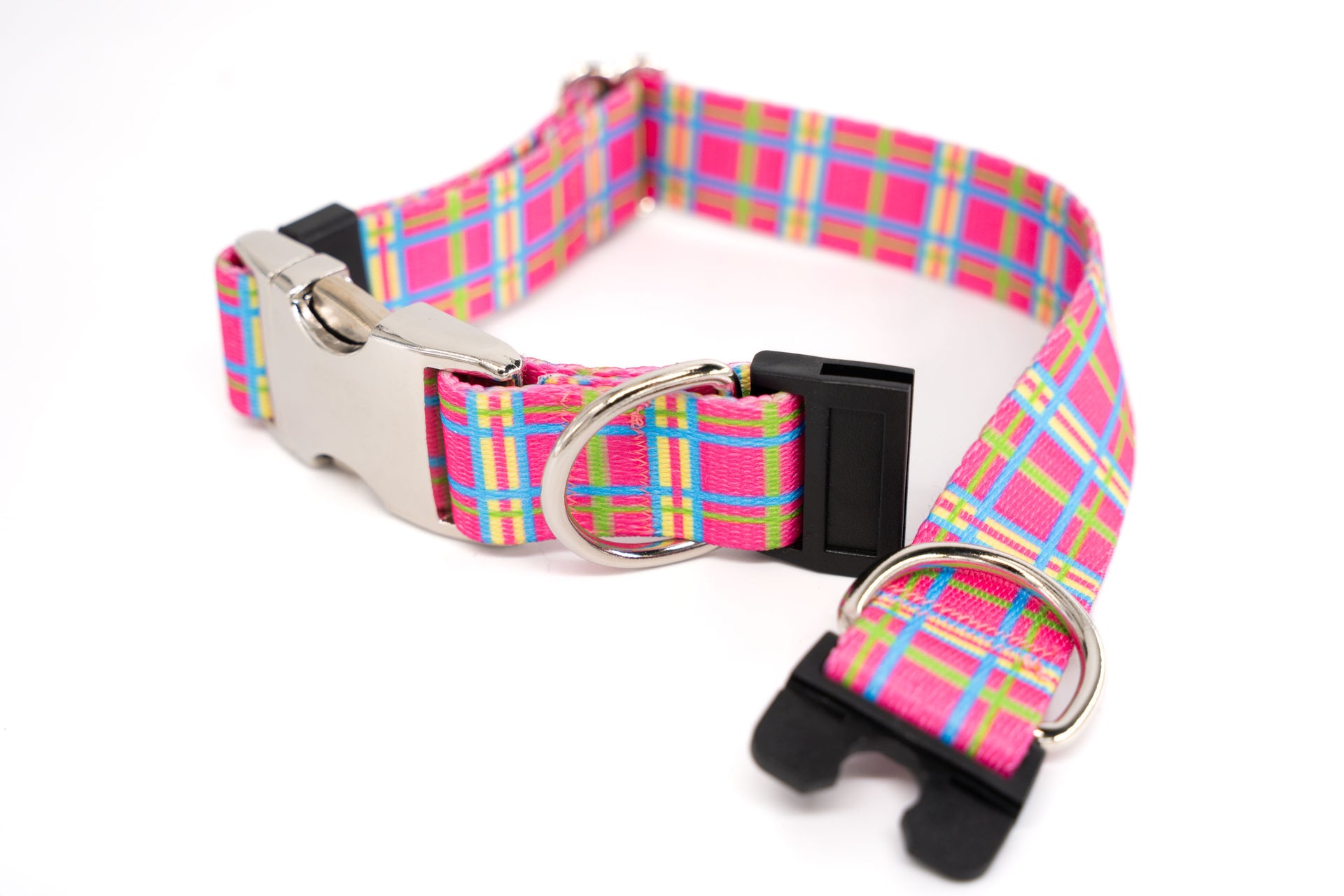 Dog collar with a colorful plaid pattern on a white background